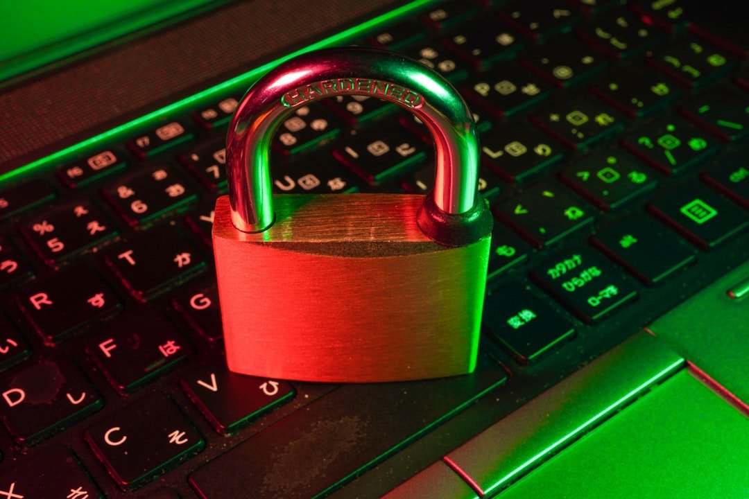 Red padlock on a black computer keyboard representing VPN security