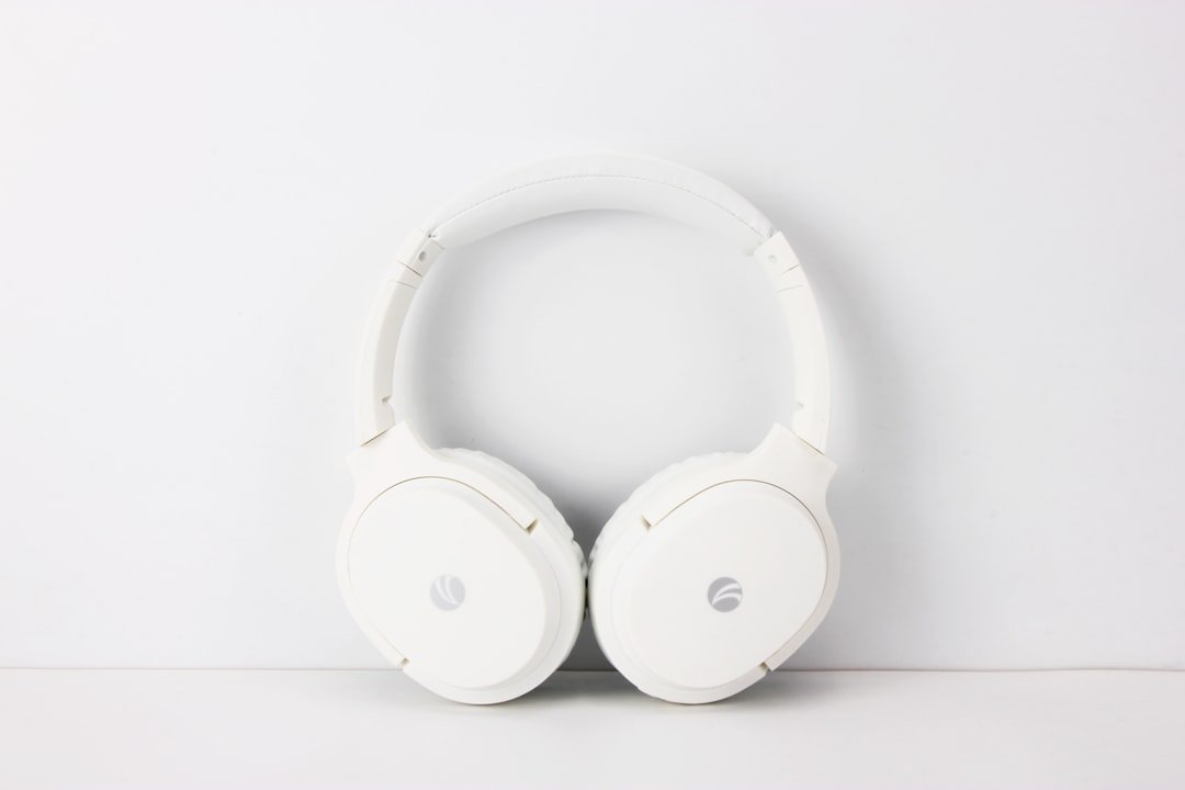 White headphones representing YouTube to MP3 audio conversion